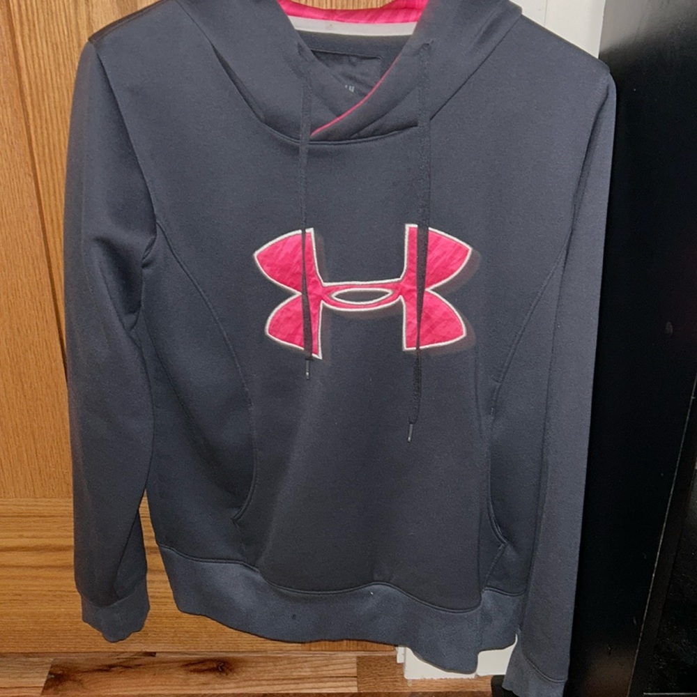 pink and grey Under Armour sweatshirt.